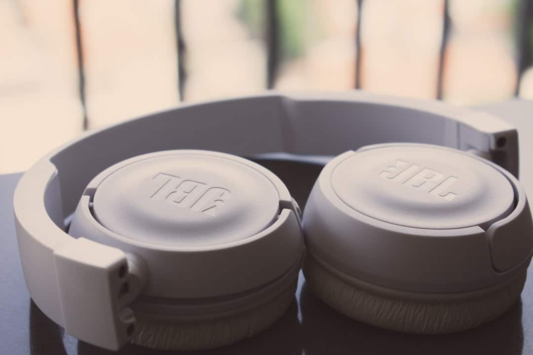 Photo by Caio Pezzo - Viaggi Over 55 white JBL wireless headphones