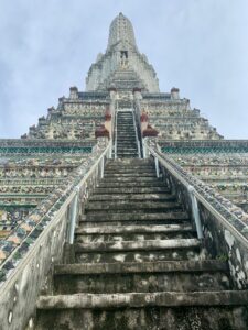 A staircase leading up to a very tall building
