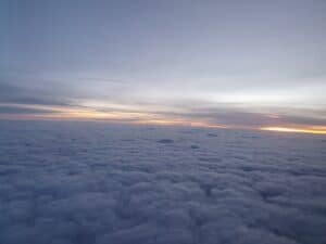 a view of the clouds from an airplane window