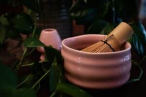 brown wooden rolling pin on white ceramic bowl